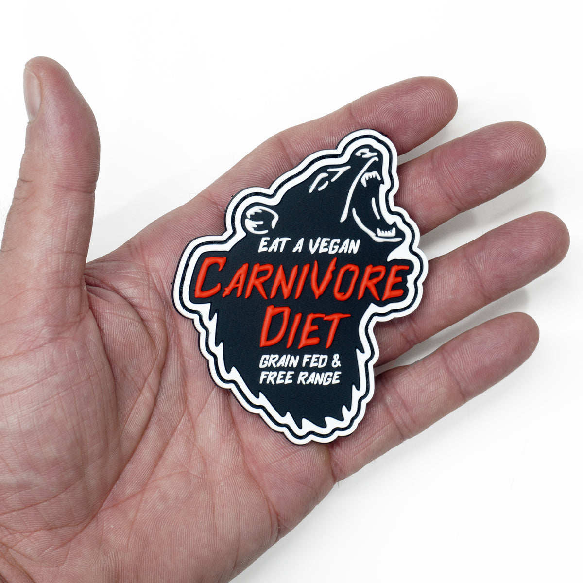 Carnivore Diet Bear PVC Morale Patch, in hand