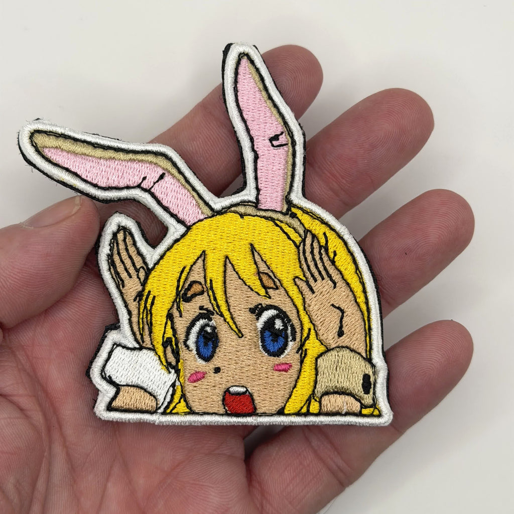 Tea Time Bunny peeker embroidered patch held in hand for size, by FOTB Patches
