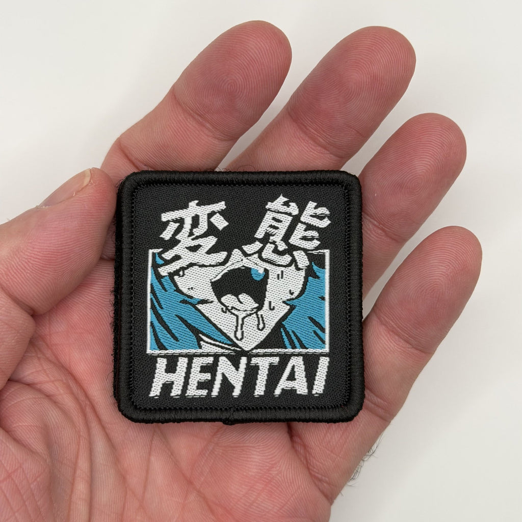 Degenerate Kanji woven patch held in hand for size, by FOTB Patches