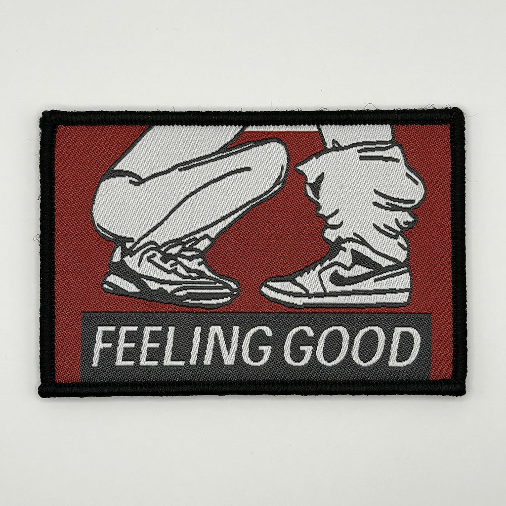 Feeling Good woven patch, two pairs of sneakers with one crouched in front of the other, by FOTB Patches