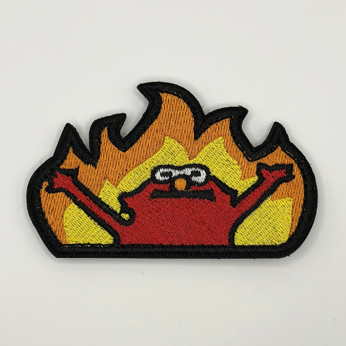 Red puppet rising from flames meme embroidered patch by FOTB Patches