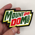 Mount and Do Me glow PVC patch held in hand, front
