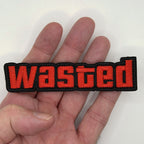 Wasted embroidered patch held in hand for size, by FOTB Patches