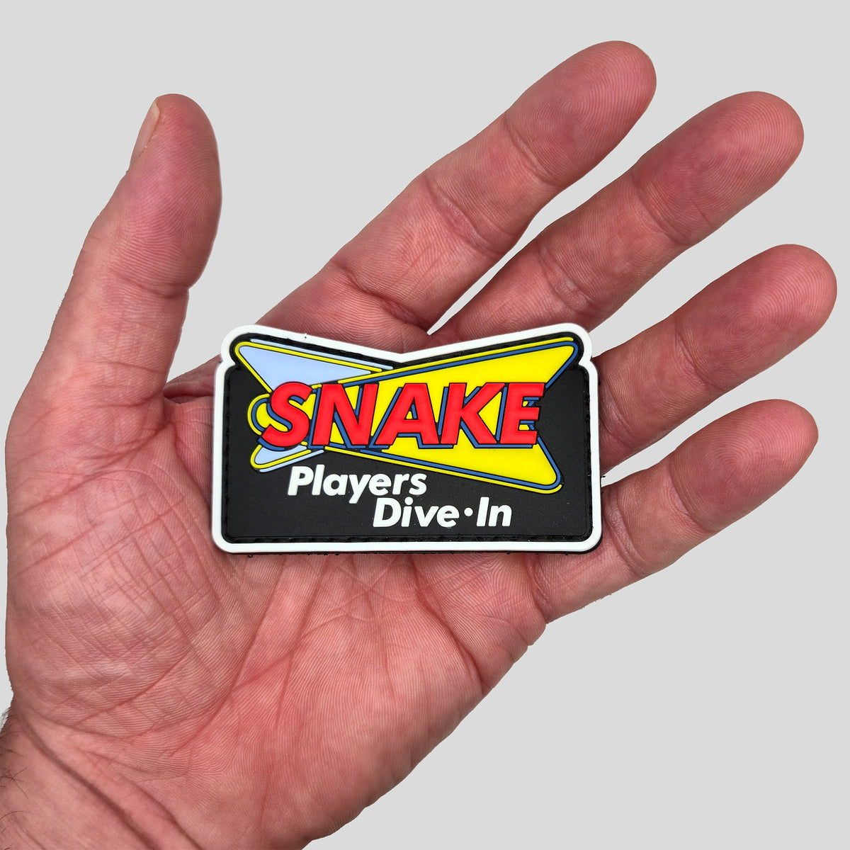 Snake Player Paintball PVC Morale Patch, SWAGR, in hand